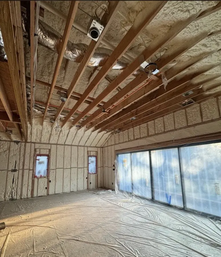 Interior walls and ceiling insulated with spray foam during new construction in Lexington